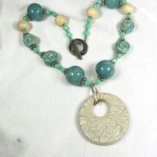 Cream Swazi Pendant on Handmade Artisan Bead Necklace