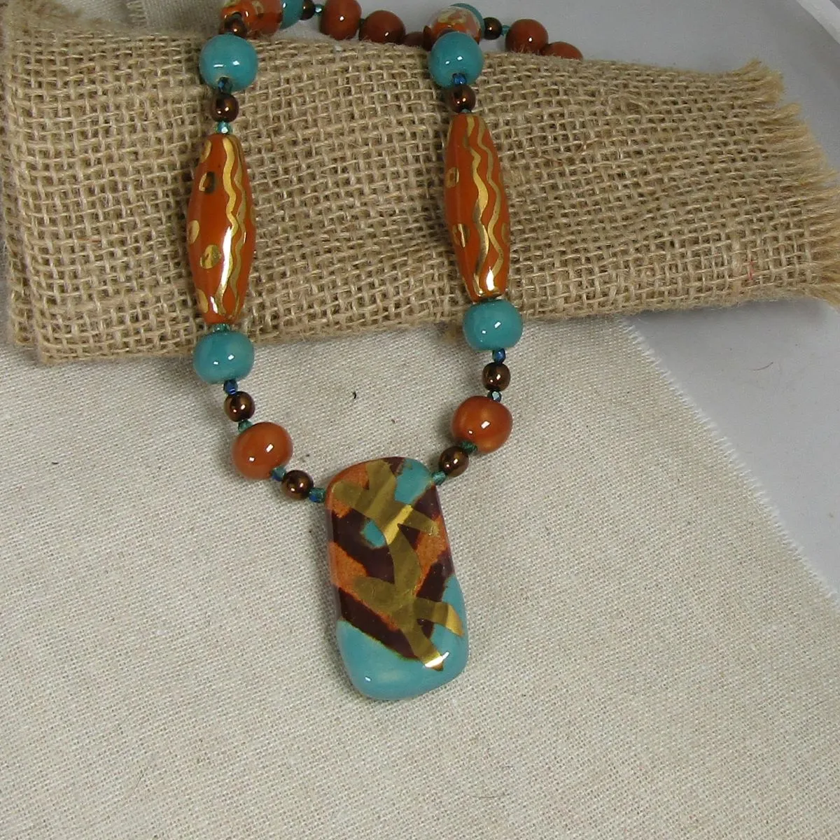 Kazuri Pendant Bead Necklace in Peacock and Gold  Fair Trade Beads