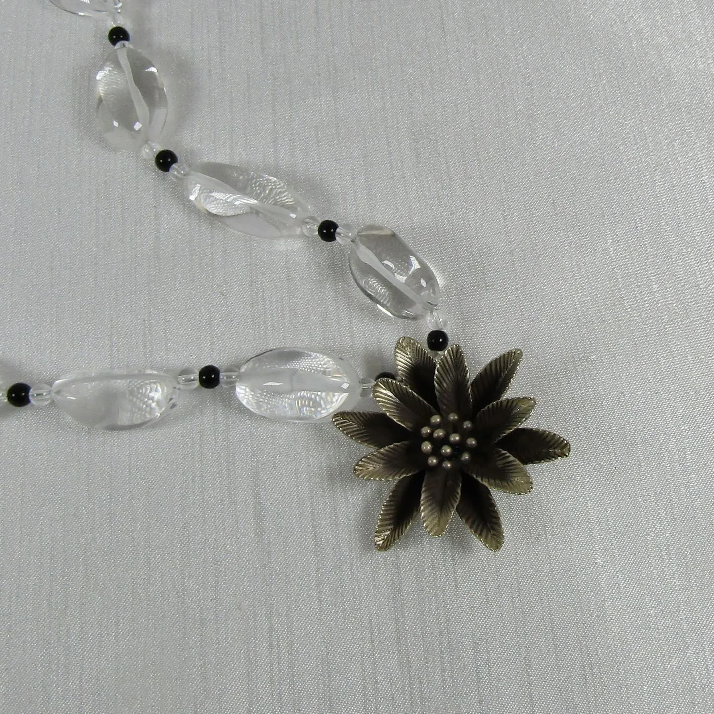 Necklace in Clear Quartz  with Silver Flower Pendant